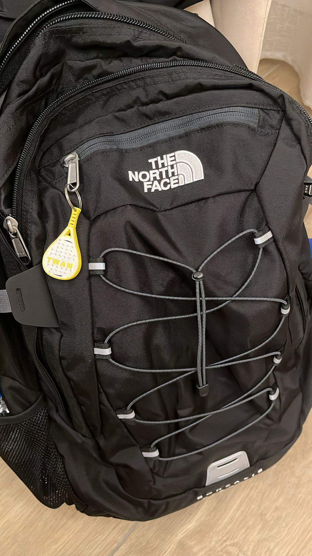 Personalised padel racket keychain with printed name and metal key ring, 3D printed in two colours