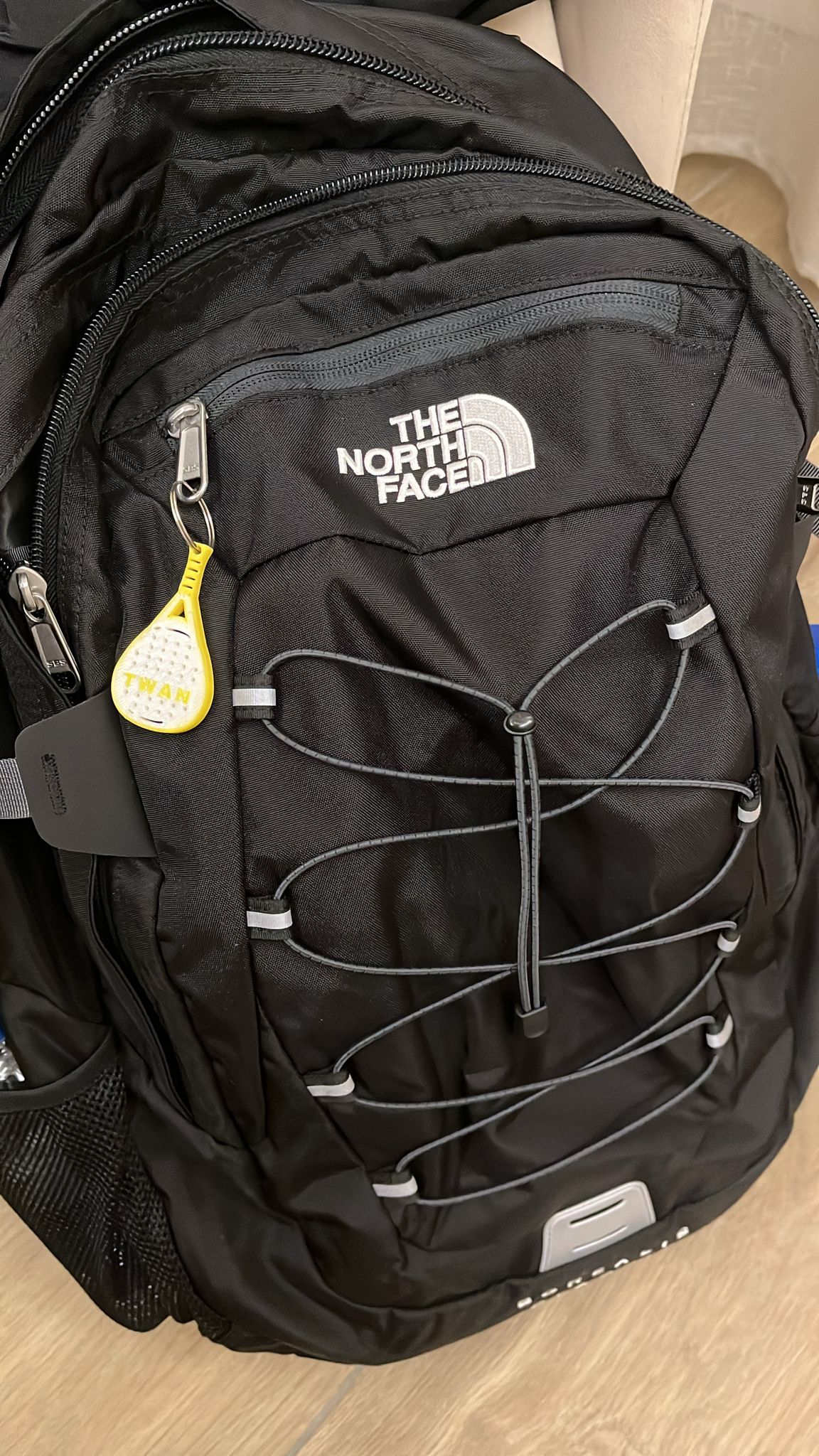 Personalised padel racket keychain with printed name and metal key ring, 3D printed in two colours