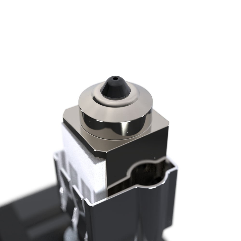 Close-up of the solid polycrystalline diamond tip on the E3D DiamondBack Bambu Lab nozzle