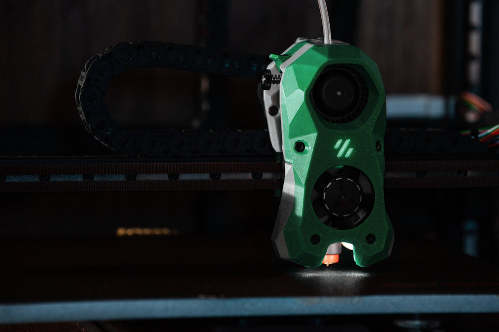 Voron Stealthburner toolhead, printed parts in green ABS. Photo: Voron Design (GPLv3). Placeholder until my own print photo.