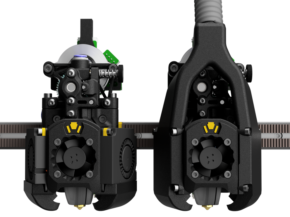 Xol toolhead with and without fans, printed parts in black with yellow accents. Render: DW-Tas / Armchair Heavy Industries (CC BY-NC-SA 4.0, used with permission). Placeholder until my own print photo.