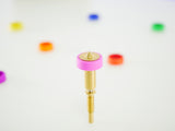 Close-up of an E3D Revo brass nozzle with pink 0.25 mm sock