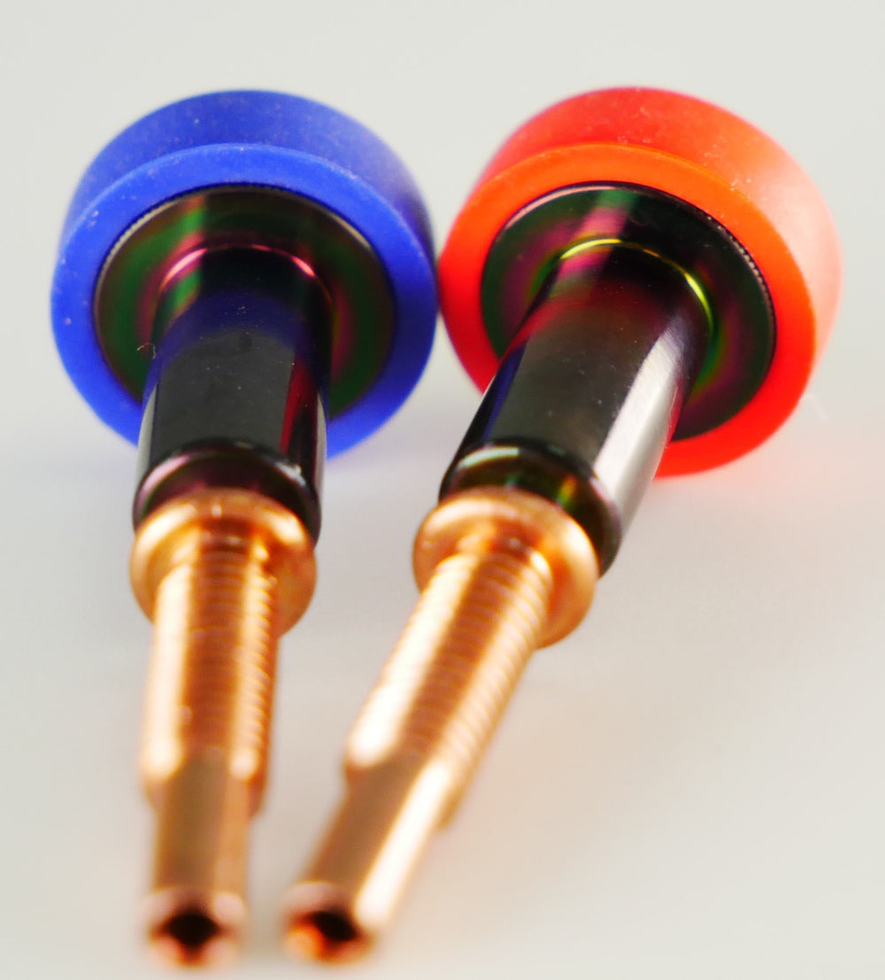Close-up of the rainbow-tinted E3DLC coating on two E3D Revo ObXidian nozzles