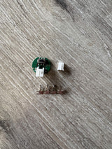 TES MicroFlip N20 motor reverser PCB with slide switch and JST-PH connector, plus spare housing and crimp pins